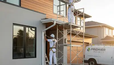Professional trim and fascia painting on a home exterior in San Antonio, TX by expert house painters